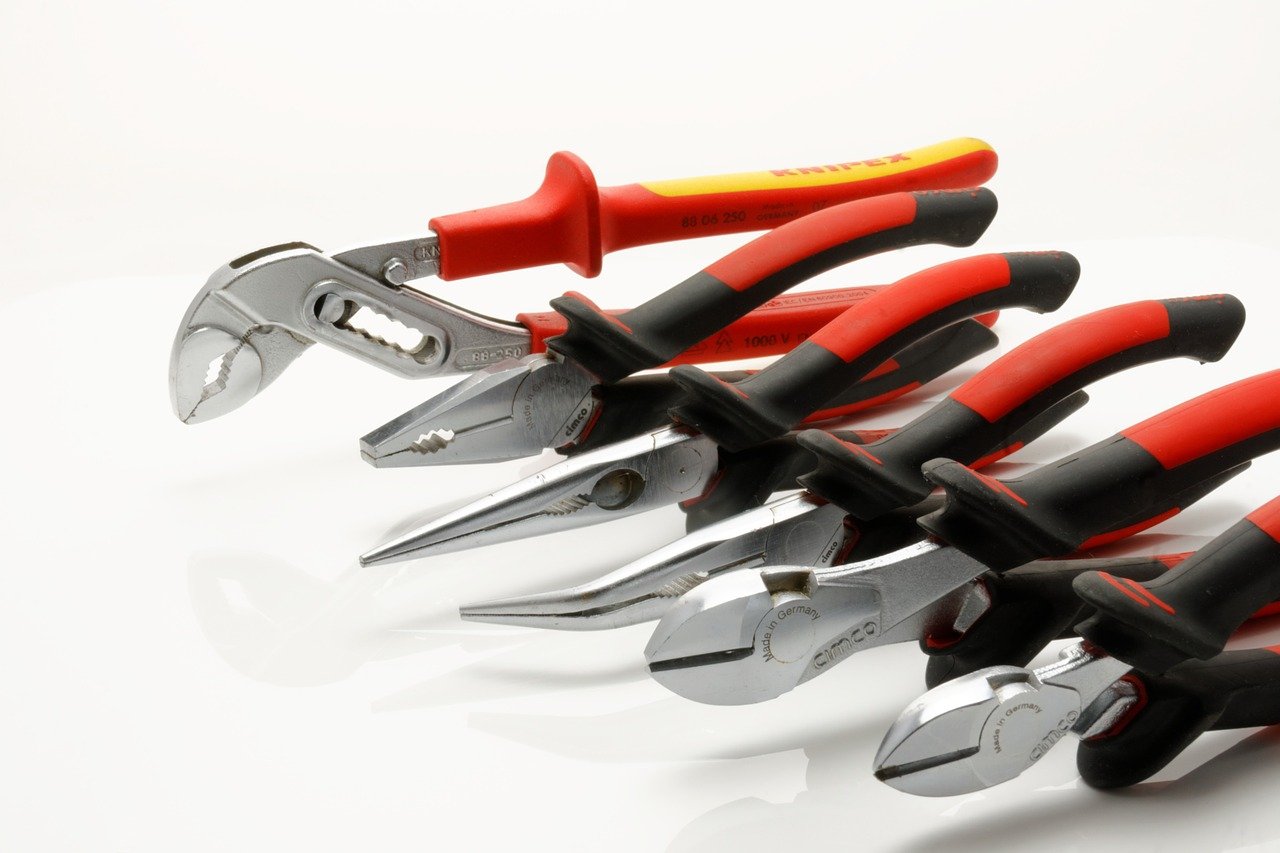 Six diagonally laid out wire cutters of different shapes to be used for different purposes.